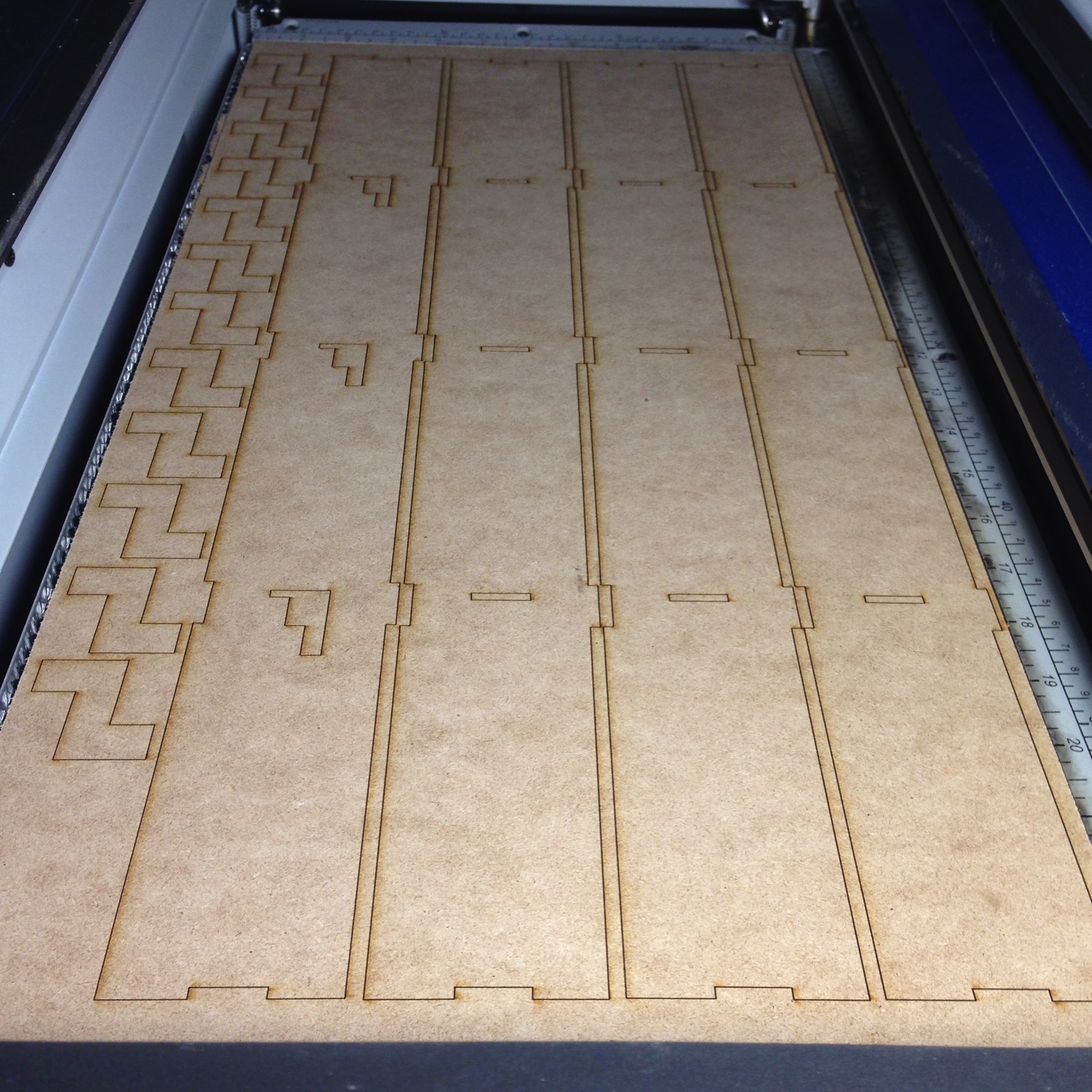 Laser cutting column side panels and Z-Pegs